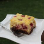 Cheesecake-Brownies mit Himbeeren Rezept