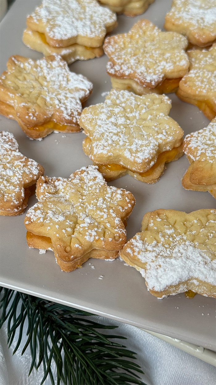 Butterzarte Orangenplätzchen in Schneeflockenform Rezept 1