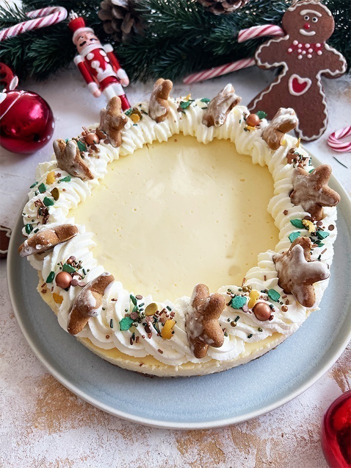 Cheesecake mit Zimtsternenboden und Orange 
