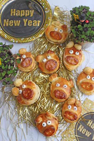 Glücksschweinchen aus hefeteig - gefüllt mit haselnuss-marzipan 1
