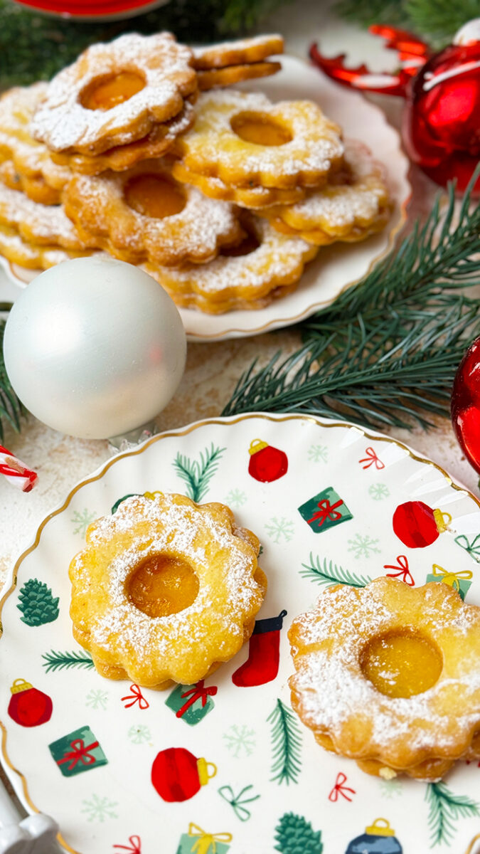 Sagenhafte Orangen-Spitzbuben mit Tonkabohne Rezept Sagenhafte Orangen-Spitzbuben mit Tonkabohne Rezept